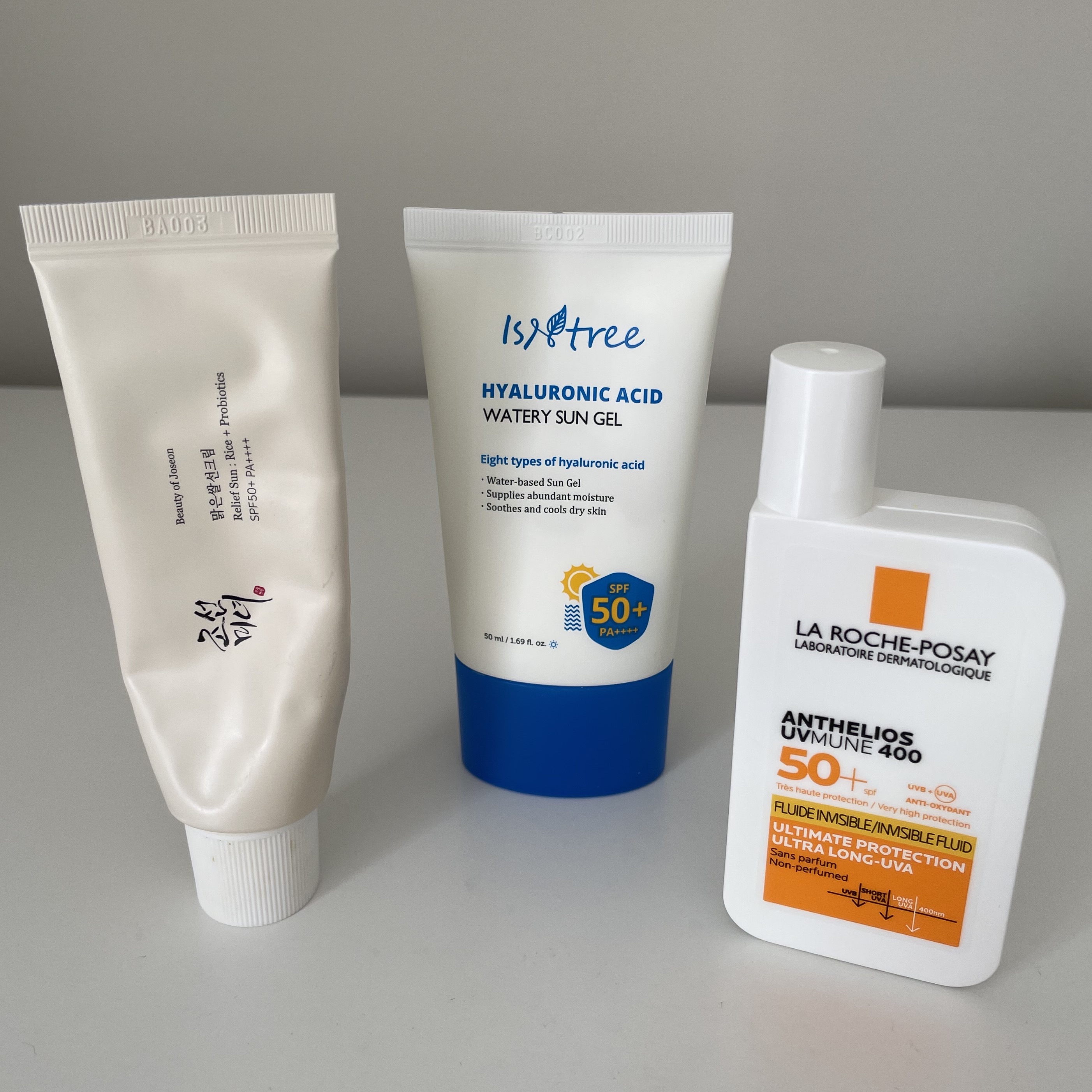 Photograph of the three facial sunscreens featured in this article.