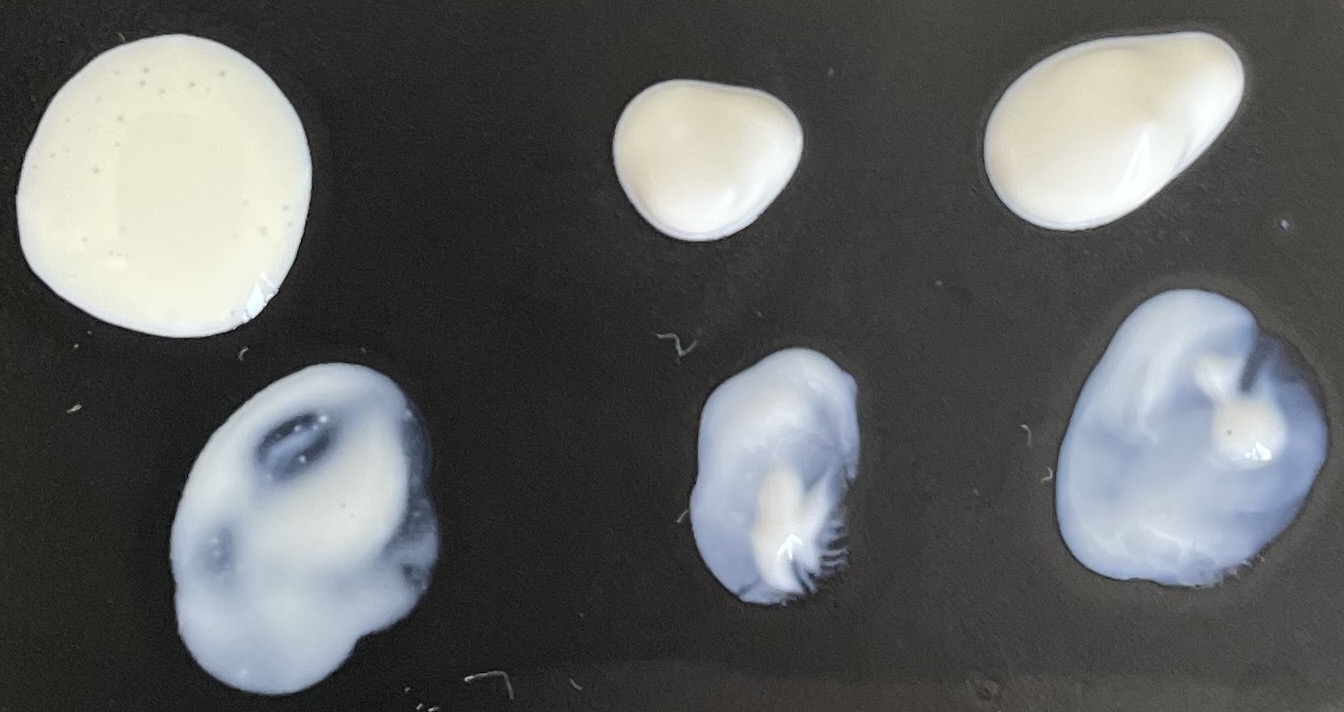 Photograph of the products' textures.  From left to right: LRP UVmune 400 Invisible Fluid, Isntree Watery Sun Gel, and Beauty of Joseon Relief Sun.